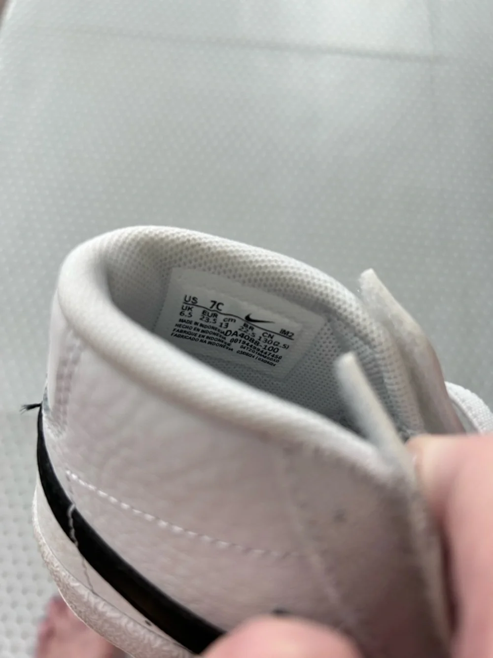 Nike Kids White and Black High-Top Sneakers. Size 7C